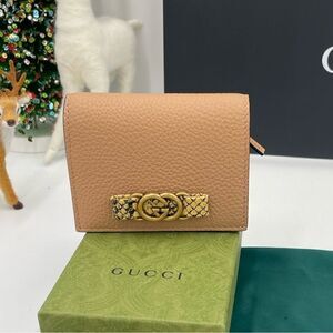Women’s Gucci, interlocking G python bow leather wallet made in Italy